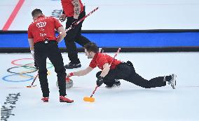 (BEIJING2022)CHINA-BEIJING-WINTER OLYMPIC GAMES-CURLING-MEN'S ROUND ROBIN-DEN vs SUI  (CN)