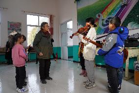 Xinhua Headlines: Rural children's choir sings its way onto Olympic stage