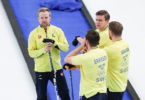 (BEIJING2022)CHINA-BEIJING-OLYMPIC WINTER GAMES-CURLING-MEN'S ROUND ROBIN SESSION-SWE VS ROC (VN)