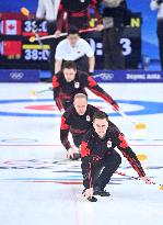 (XHTP)(BEIJING2022)CHINA-BEIJING-OLYMPIC WINTER GAMES-CURLING-MEN'S ROUND ROBIN SESSION-CHN VS CAN (CN)