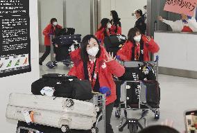 Japanese athletes return from Beijing
