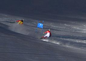 (SP)CHINA-BEIJING-WINTER PARALYMPICS-ALPINE SKIING-WOMEN'S DOWNHILL-VISION IMPAIRED (CN)