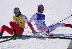 (SP)CHINA-ZHANGJIAKOU-WINTER PARALYMPICS-BIATHLON-MEN'S SPRINT-VISION IMPAIRED(CN)