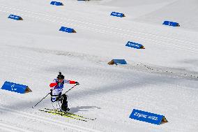 (SP)CHINA-ZHANGJIAKOU-WINTER PARALYMPICS-PARA CROSS-COUNTRY SKIING -WOMEN'S LONG DISTANCE SITTING(CN)