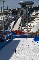 (SP)CHINA-ZHANGJIAKOU-WINTER PARALYMPICS-PARA CROSS-COUNTRY SKIING -WOMEN'S LONG DISTANCE SITTING(CN)