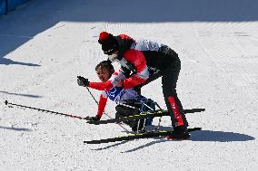 (SP)CHINA-ZHANGJIAKOU-WINTER PARALYMPICS-PARA CROSS-COUNTRY SKIING -WOMEN'S LONG DISTANCE SITTING(CN)