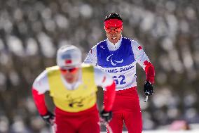 (SP)CHINA-ZHANGJIAKOU-WINTER PARALYMPICS-PARA CROSS-COUNTRY SKIING -MEN'S LONG DISTANCE CLASSIC VISION IMPAIRED (CN)
