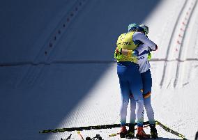 (SP)CHINA-ZHANGJIAKOU-WINTER PARALYMPICS-PARA CROSS-COUNTRY SKIING -WOMEN'S LONG DISTANCE CLASSIC VISION IMPAIRED(CN)