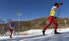 (SP)CHINA-ZHANGJIAKOU-WINTER PARALYMPICS-PARA CROSS-COUNTRY SKIING -WOMEN'S LONG DISTANCE CLASSIC VISION IMPAIRED(CN)