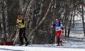 (SP)CHINA-ZHANGJIAKOU-WINTER PARALYMPICS-PARA CROSS-COUNTRY SKIING -WOMEN'S LONG DISTANCE CLASSIC VISION IMPAIRED(CN)