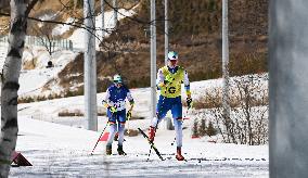 (SP)CHINA-ZHANGJIAKOU-WINTER PARALYMPICS-PARA CROSS-COUNTRY SKIING -WOMEN'S LONG DISTANCE CLASSIC VISION IMPAIRED(CN)