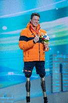 (SP)CHINA-BEIJING-WINTER PARALYMPICS-ALPINE SKIING-MEN'S SUPER COMBINED SITTING-AWARDING CEREMONY(CN)