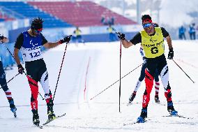 (SP)CHINA-ZHANGJIAKOU-WINTER PARALYMPICS-PARA CROSS-COUNTRY SKIING-MEN'S SPRINT FREE TECHNIQUE VISION IMPAIRED(CN)
