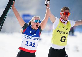 (SP)CHINA-ZHANGJIAKOU-WINTER PARALYMPICS-PARA CROSS-COUNTRY SKIING-WOMEN'S SPRINT FREE TECHNIQUE VISION IMPAIRED(CN)