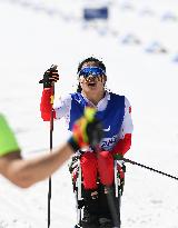 (SP)CHINA-ZHANGJIAKOU-WINTER PARALYMPICS-PARA CROSS-COUNTRY SKIING-WOMEN'S MIDDLE DISTANCE SITTING(CN)