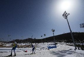 (SP)CHINA-ZHANGJIAKOU-WINTER PARALYMPICS-PARA CROSS-COUNTRY SKIING-WOMEN'S MIDDLE DISTANCE VISION IMPAIRED (CN)