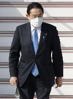 Japan PM Kishida returns to Tokyo