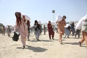 AFGHANISTAN-KABUL-CHINA-FOOD AID-DISTRIBUTION