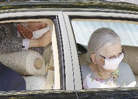 Former Japan emperor, empress move out of temporary home