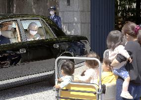 Former Japan emperor, empress move out of temporary home