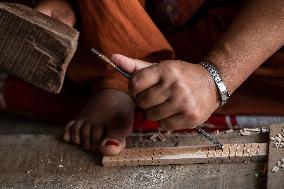 NEPAL-LALITPUR-WOOD CARVING