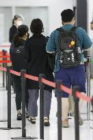 Japan expands daily arrival cap to 20,000 as COVID fears recede