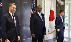Japan, U.S., Australian defense chiefs meet in Singapore