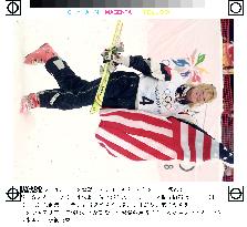 US's Stone flashes golden smile