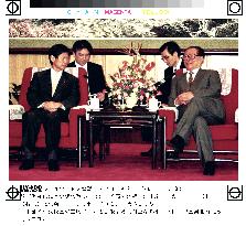 Komura, Jiang hold talks