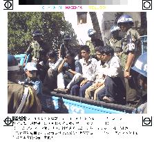 Cambodian demonstrators arrested and taken by truck