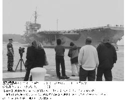 U.S. carrier Kitty Hawk leaves Yokosuka