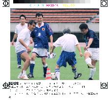 Lawmakers practice soccer for game with S. Korea