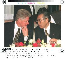 Obuchi talks with Clinton