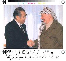 Obuchi meets Palestinian leader Arafat