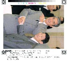 New Tokyo Gov. Ishihara shakes hands with former governor