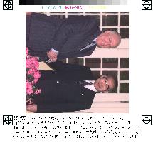 Obuchi, Chernomyrdin shake hands at meeting