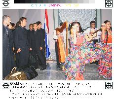 Japan's soccer team greeted by Paraguayan dancers