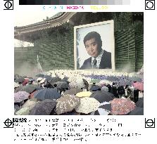 Fans attend memorial service for late actor Ishihara