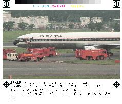 Delta airliner runs aground at Narita airport