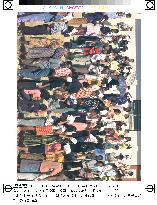 E. Timorese queue to vote for future territory