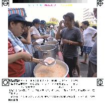 Volunteers serve food to Taiwan quake victims