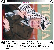 Arafat meets press in Tokyo