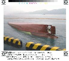 Tanker capsizes after colliding with freighter in Yamaguchi
