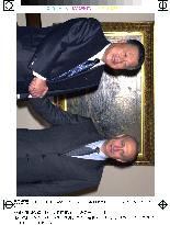 Mori, Putin shake hands before talks