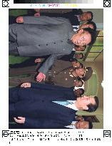 Two Kims walk to summit venue