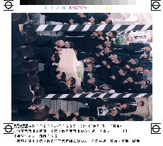 Takeshita's coffin carried from funeral hall