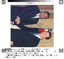 S. Korea's Kim shakes hands with Japanese FM Kono