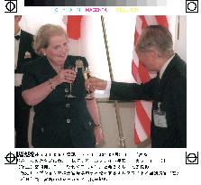 Albright toasts at reception in Miyazaki