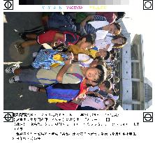 Children evacuate Miyakejima