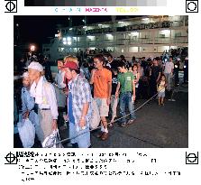 Miyakejima residents arrive at Tokyo port